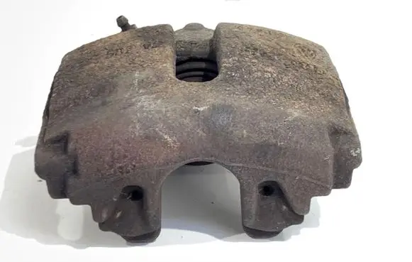 Volkswagen PASSAT B7 Front brake caliper 