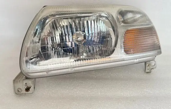 Suzuki Grand Vitara I Headlight/headlamp 10032078