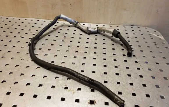 Volkswagen Touareg I Engine coolant pipe/hose 7L6122447AT