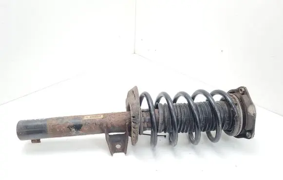Volkswagen Caddy Front shock absorber with coil spring 1K0413031BA