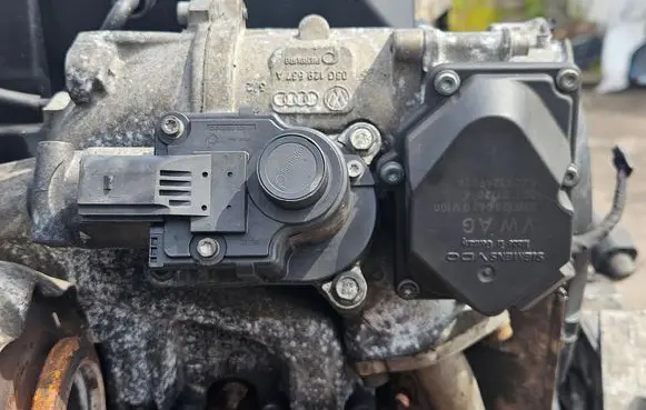 Volkswagen PASSAT B6 Throttle valve 03G128063G 03G128637A 03G131502