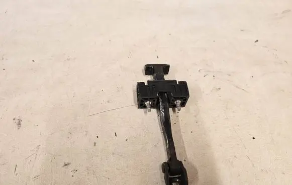 Opel Zafira B Front door check strap stopper 13227947