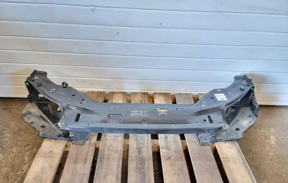 Top upper radiator support slam panel