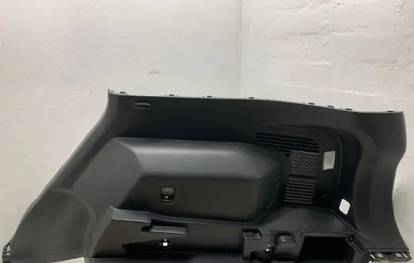 Trunk/boot lower side trim panel