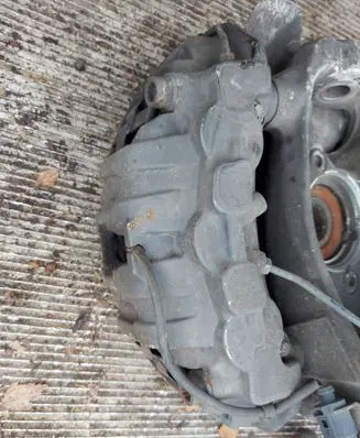 Volkswagen Touareg II Front brake caliper 7PP615123