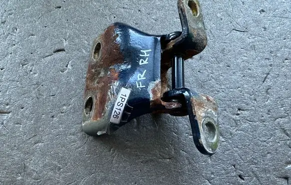 Mitsubishi Pajero Front door upper hinge MB227228