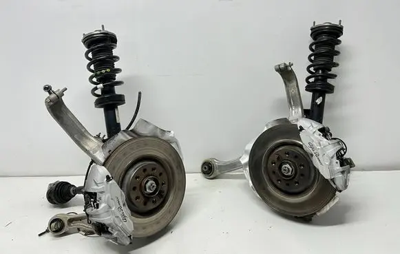 Front wheel hub spindle knuckle