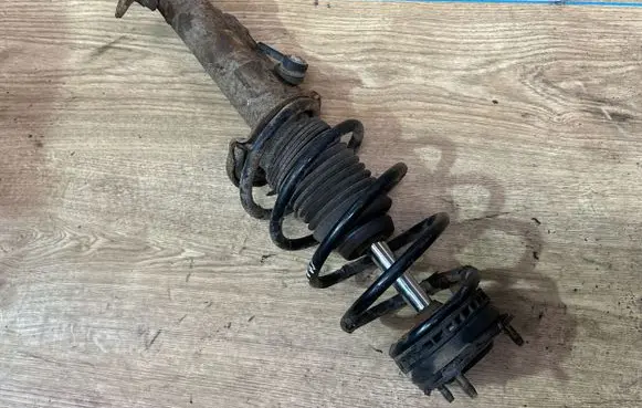 Mazda 2 Front shock absorber with coil spring