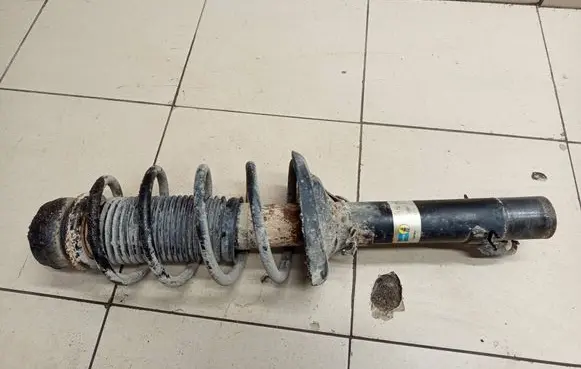 Volkswagen Golf IV Front shock absorber with coil spring 