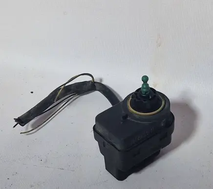 Renault Megane I Headlight level adjustment motor 7700840141