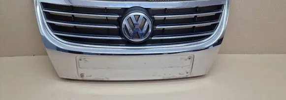 Volkswagen Touran I Front bumper upper radiator grill 1T0853651G