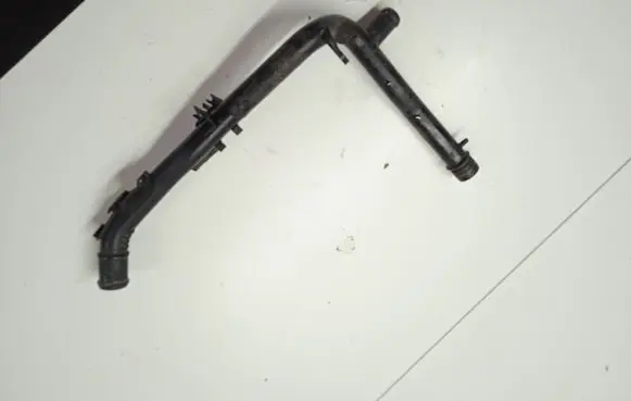 Volkswagen Touran II Engine coolant pipe/hose 03L121065