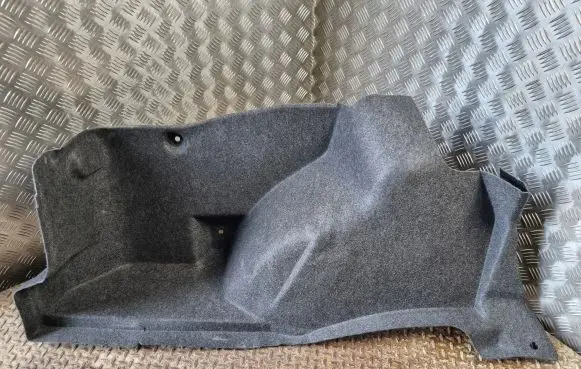 Trunk/boot lower side trim panel
