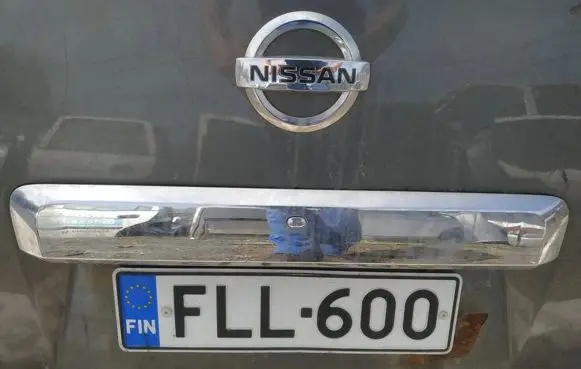 Trunk door license plate light bar