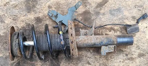 Front shock absorber with coil spring