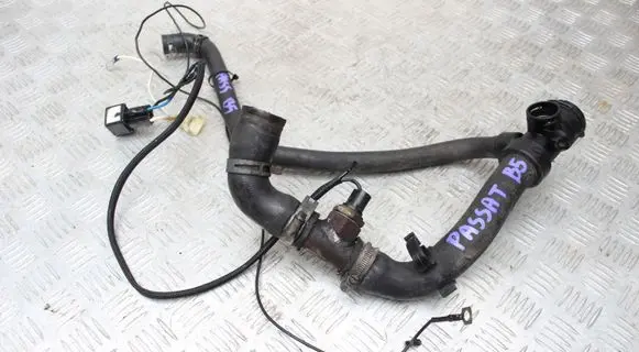 Volkswagen PASSAT B5 Engine coolant pipe/hose 4B0121049K