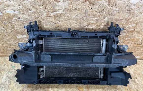 Radiator support slam panel