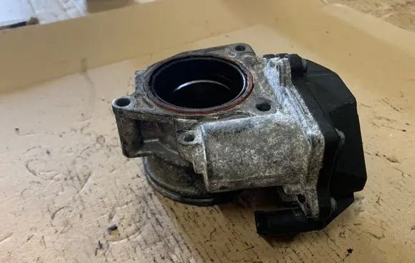 Volkswagen Touran I Throttle valve 03G128063G A2C53249824 1111070029
