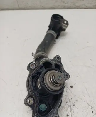 Thermostat/thermostat housing