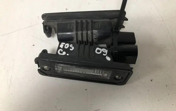 Volkswagen Eos Number plate light 1J6943021B
