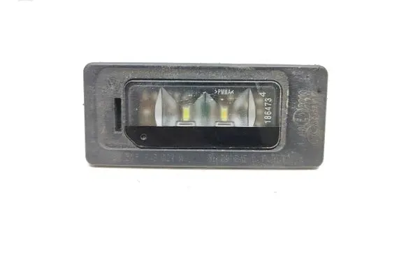 Volkswagen Touran II Number plate light 3af943021a