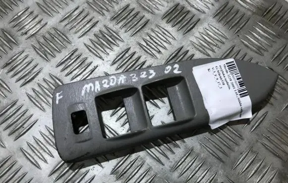 Mazda 323 F Front door window switch trim bl4e66350