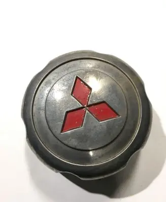 Mitsubishi L200 Original wheel cap MB816581