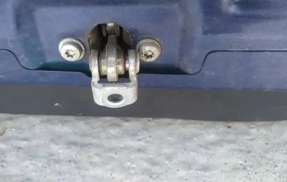 Rear door check strap stopper