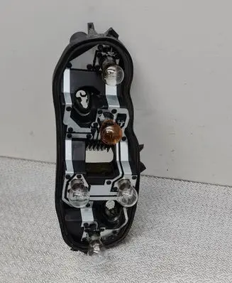 Opel Corsa D Tail light bulb cover holder 89037852A 0PE4400