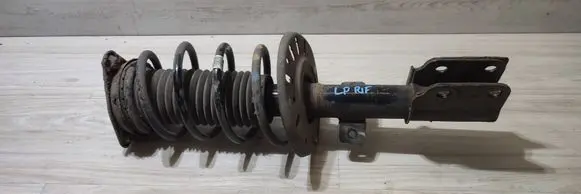 Front shock absorber with coil spring