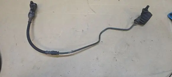 Volkswagen PASSAT B6 Clutch pipe/line FM277001