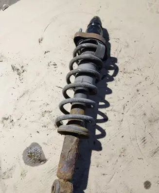Nissan Qashqai+2 Rear shock absorber with coil spring 