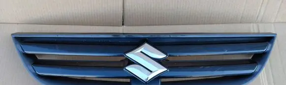 Suzuki Liana Front bumper upper radiator grill 7211154GB0