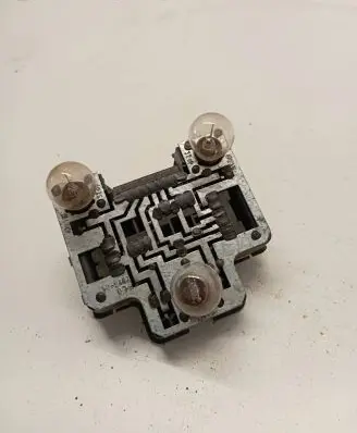 Tail light bulb cover holder