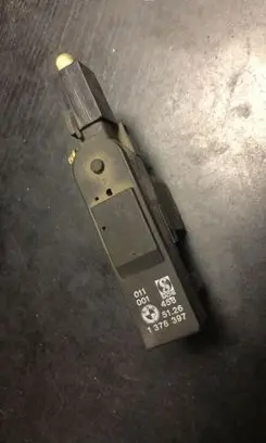 Fuel tank cap lock motor