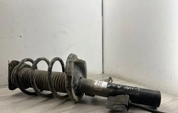Front shock absorber with coil spring