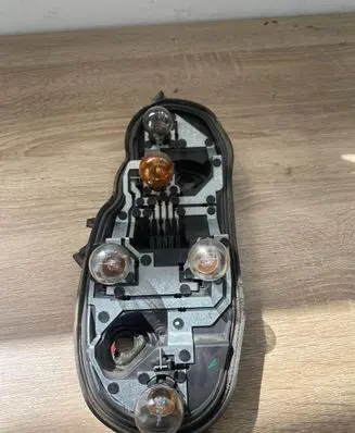 Opel Corsa D Tail light bulb cover holder 89037853 8PE4400