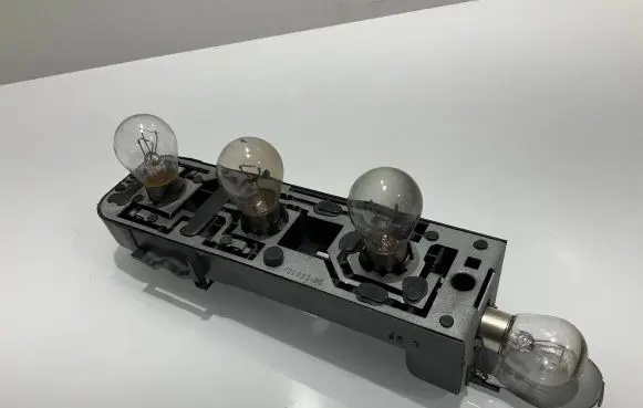 Mercedes-Benz C W203 Tail light bulb cover holder