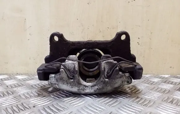 Volkswagen PASSAT B7 Front brake caliper