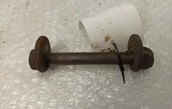 Front suspension camber bolt