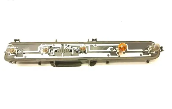 Tail light bulb cover holder