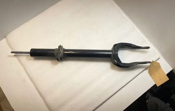 Front shock absorber with coil spring