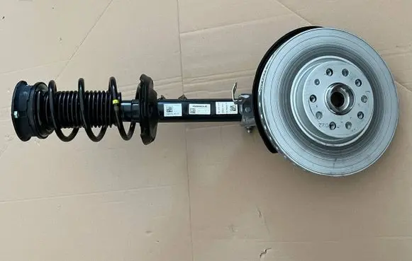 Volkswagen Golf VIII Front shock absorber with coil spring 5Q0412043CA 5Q0413031KK 5WA407257C