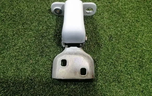 Front door lower hinge