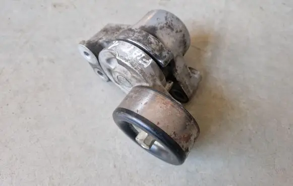 Generator/alternator belt tensioner