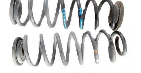 Volkswagen PASSAT B7 Coil spring/strut mount 