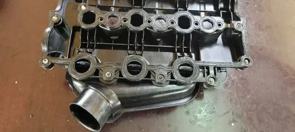 Rocker cam cover