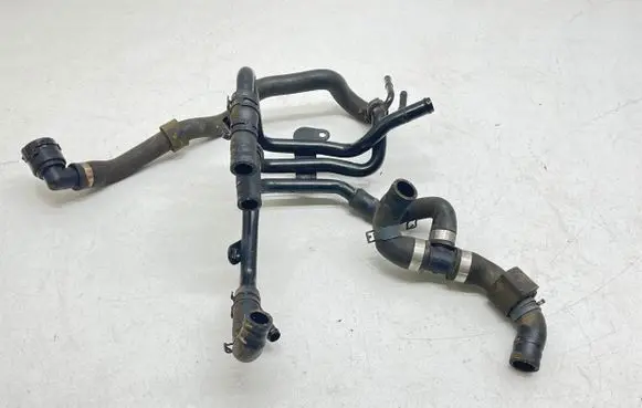 Volkswagen Touran III Engine coolant pipe/hose 04L121064AE
