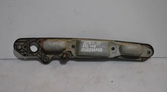 Volkswagen Jetta V Rear door handle trim 1TO827574B
