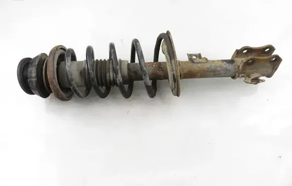 Suzuki Swift I Front shock absorber with coil spring 4160163J61